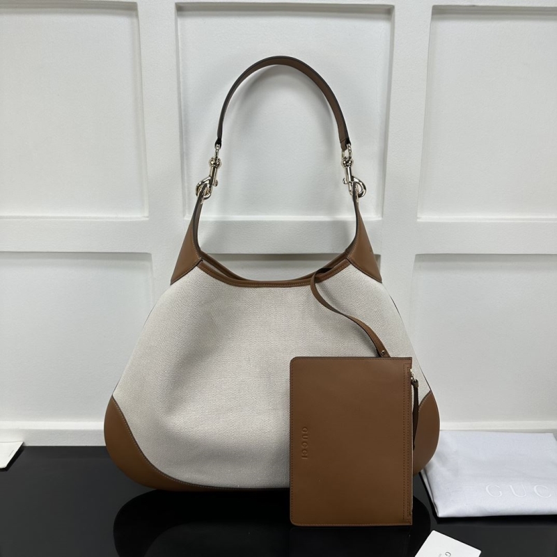 G*u*i top handle bags